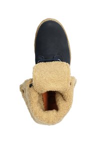 Dark blue leather boot with a tan fleece lining, round toe, and lace-up design. Features a textured, soft inner lining and durable sole.