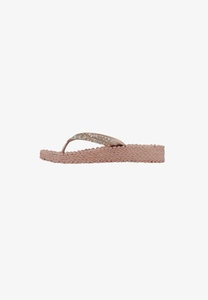 Pink flip-flop with a braided textured sole and a shiny strap adorned with glittering accents, featuring a minimalist design.