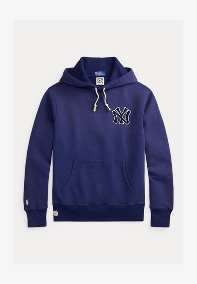 Temno modra jopa iz mehke tkanine, z žepom spredaj, belimi vrvicami in vezenim logotipom NY na prsih.