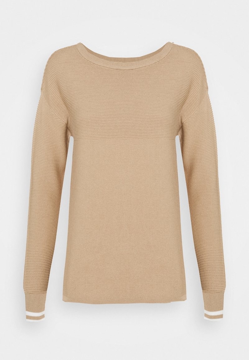 Pull beige à manches longues à côtes avec col rond et détail à double rayure blanche sur les poignets, présenté sur un fond uni.