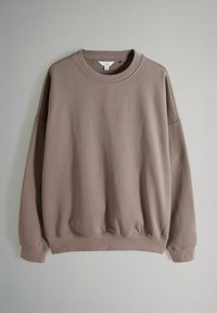 Brun sweatshirtoverdel av mjukt tyg, med rund hals, neddragna axlar, ribbade muddar och en avslappnad passform.