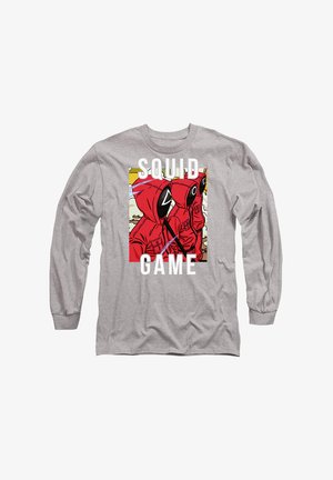 Gray long-sleeve shirt featuring a graphic of two figures in red hooded outfits with masks, labeled "SQUAD GAME" in bold white text.
