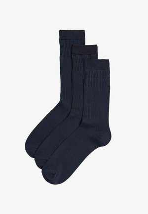 Calzini blu navy a costine in confezione da tre. Presentano una texture liscia, tallone e punta rinforzati, e un design con polsino confortevole.