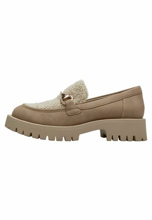 Tan loafers with a textured cream upper, gold hardware accent, and a chunky, ridged outsole for traction and stability.