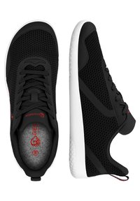 Black athletic shoes with mesh upper and rubber sole. Features curved lines and subtle red accents. Lace-up design with padded collar.