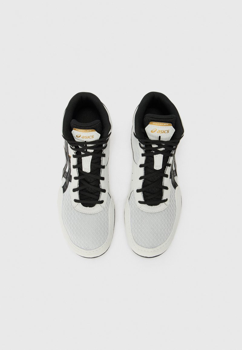 High-top athletic shoes in grey mesh with black accents and laces. Features cushioned collar and signature branding on the tongue.