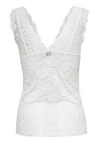 Haut blanc sans manches en dentelle avec motif floral et décolleté en V festonné.