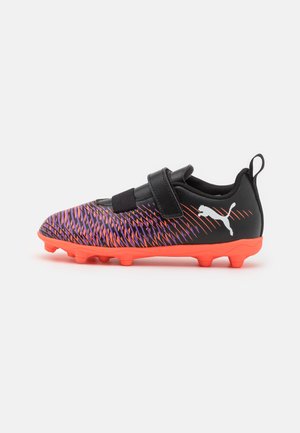 Black soccer cleat with orange and purple diagonal stripes, Velcro strap, textured upper, and a contrasting pink outsole.