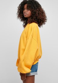 Urban Classics OVERSIZED TRIANGLE CREW NECK - Bluză de molton - magicmango