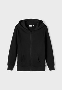 Felpa nera con zip realizzata in cotone, con una superficie testurizzata, dotata di tasca a canguro frontale e cappuccio regolabile. Design semplice e minimalista.