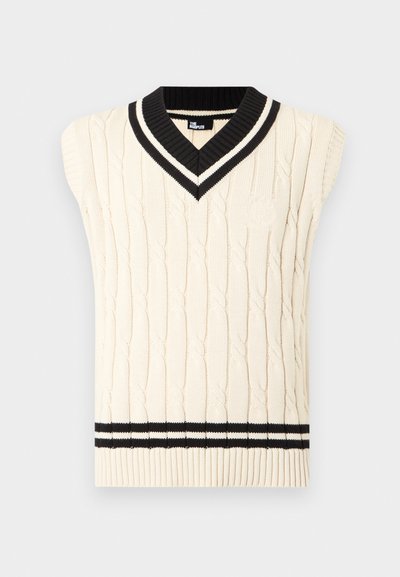 Κρεμ γιλέκο χωρίς μανίκια με πλέξη καλώδιο, με μαύρες και λευκές ριγέ λεπτομέρειες στο V-λαιμό και στο τελείωμα.