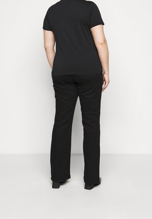 Black short-sleeve shirt paired with black straight-leg pants. Both have a smooth texture and a relaxed fit, featuring minimal design details.