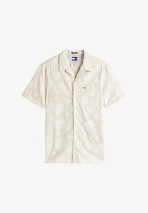 Short-sleeve collared shirt in light beige with white floral pattern. Features a front pocket and a subtle brand logo on the chest.