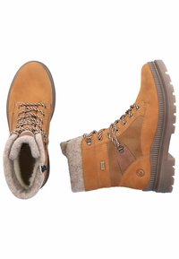 Botas de tobillo impermeables en color marrón claro con un cuerpo de cuero texturizado, cuello de fieltro, cordones con diseño y suela resistente para mayor tracción.