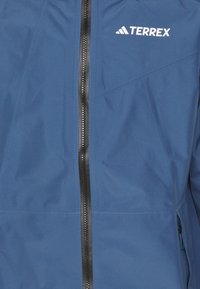 adidas Terrex XPR GORE PAC JJACKET - Giacca hard shell - blue