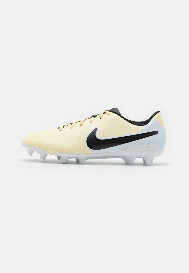 Yellow football cleat with black accents, textured upper, and white outsole. Features a sleek design and multiple spike studs for traction.
