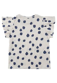 Vaalea yläosa, jossa on lyhyet röyhelösleevit ja tummansiniset pisteet tekstuuripinnalla. Pyöreä kaula-aukko, rento malli.