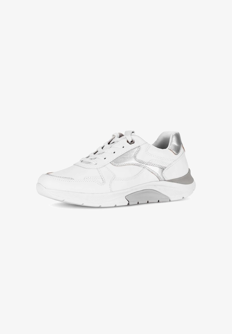 White sneaker with silver accents, lace-up design, and thick sole, shown from the side on a white background.