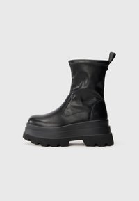 JUPITER - Platform boots - black