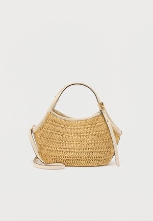 Beige woven handbag with rounded shape, featuring a cream leather handle and adjustable shoulder strap with gold-tone buckle detail.
