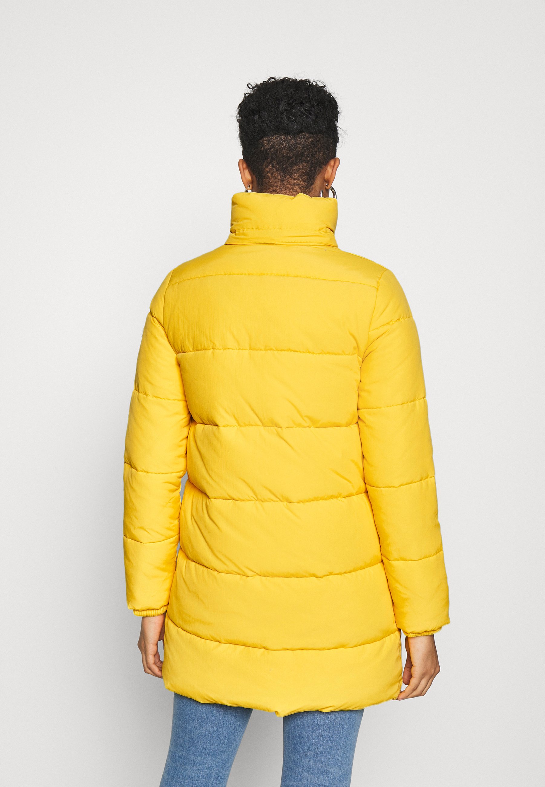 yellow tommy coat