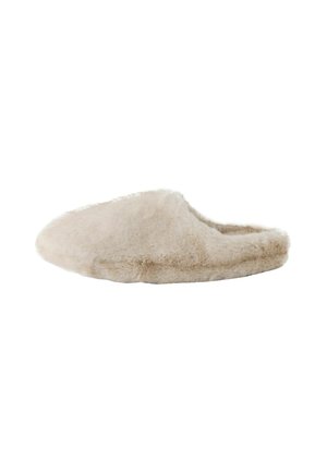 Beige soft fuzzy slipper with closed toe and open back, designed for indoor comfort and warmth.
