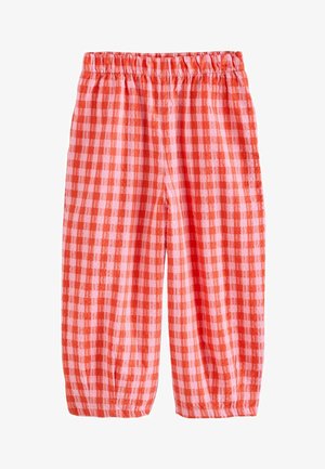 Rote und rosa karierten Hosen mit einem elastischen Bund, kurzer Länge und gerafften Bündchen am Saum, aus leichtem Stoff.