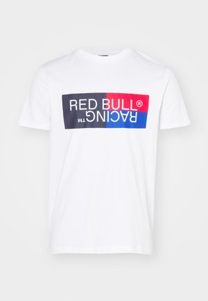 Biała bawełniana koszulka z krótkim rękawem, z poziomym nadrukiem "RED BULL® RACING" w kolorach czarnym, czerwonym i niebieskim. Okrągły dekolt.
