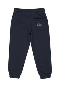 Mørkeblå sweatpants med elastisk talje, afsluttede ankler og en baglomme med et lille logodetalje. Fremstillet af blødt stof.