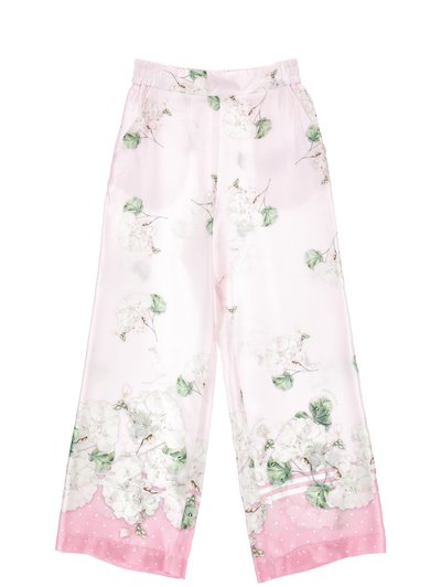 Ροζ ανοιχτόχρωμο παντελόνι με φαρδιά μπατζάκια, διακοσμημένο με λευκά ανθικά σχέδια και πράσινα φύλλα, με ελαστική μέση και ροζ μανσέτες με πουά.