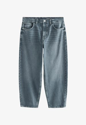 Barrel fit jeans in light blue wash, crafted from denim. Features five pockets with subtle whiskering and a straight leg design.