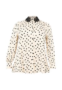 Crème blouse met zwarte stippen, lange pofmouwen, knoopsluiting aan de voorkant en decoratieve zwarte kant kraag.