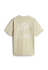 T-shirt med korte ærmer i beige med et hvidt kraniet grafik og tekst på ryggen. Har en standard pasform og en glat bomuldsstruktur.