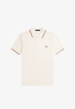Polo de color crema hecho de algodón. Cuenta con una tapeta de dos botones, un cuello y puños de las mangas a rayas en contraste, y un logo bordado en el pecho.