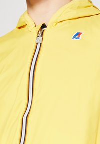 K-Way Impermeabile - yellow