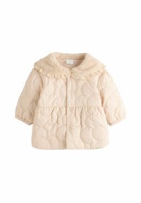 Beige gepolsterte Jacke mit einem Pelzkragen, gekennzeichnet durch ein gesteppte kreisförmiges Muster, Druckknopfverschlüsse und kurzen, puffigen Ärmeln.
