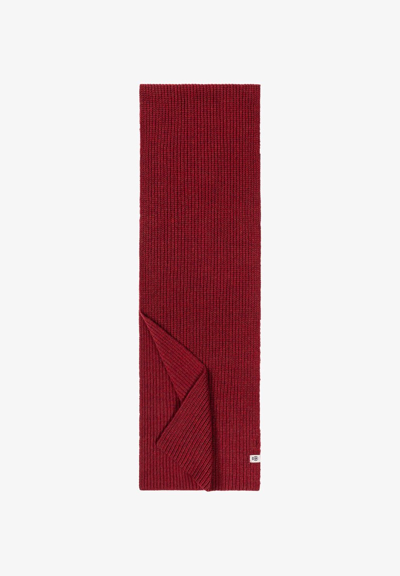 Red knitted scarf with ribbed texture, featuring a folded end. Small label on one corner, machine-knit design.