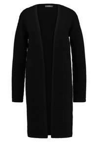 Svart stickad cardigan med ribbad textur, öppen framsidan, långa ärmar och utan knäppningar. Designen är enkel och klassisk.