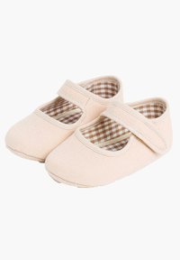 Jasnoróżowe płócienne buty w stylu Mary Jane, z zapięciem na rzep oraz brązowo-białym w kratkę wyłożeniem wewnętrznym.