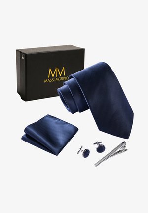 Navy silk tie with a ribbed texture, matching pocket square, silver cufflinks, and tie clip in a black gift box with gold lettering.