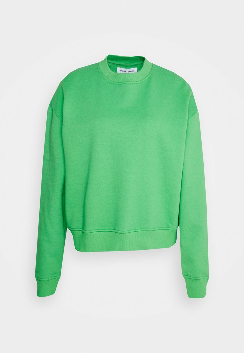 Sweat-shirt vert vif à col rond, manches longues avec poignets et ourlet côtelés, présenté sur fond blanc.