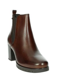 Stivaletto alla caviglia in pelle marrone con una finitura lucida, pannello laterale testurizzato e tacco impilato. Presenta un'etichetta per un facile indossamento.