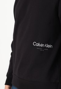 Calvin Klein OFF PLACEMENT LOGO  - Sweatshirt - black