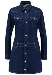 Tummansininen farkkumekko, jossa on tiukka siluetti, pitkät hihat, rintataskut ja hopeiset napit. Sisältää ompeluyksityiskohtia ja sivutaskuja.