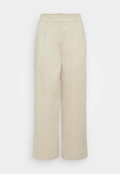 Beige wijde broek van katoenmix, met voorplooien, een hoge taille en een gladde textuur. Geen zichtbare hardware of patronen.