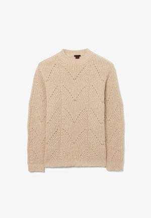 Maglione beige lavorato a maglia con un motivo a zigzag testurizzato, scollatura rotonda e polsini e orlo a coste. La composizione sembra morbida e testurizzata.