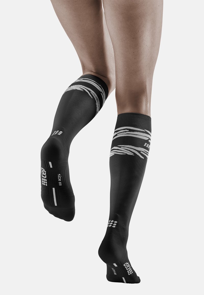 CEP ANIMAL COMPRESSION Sports socks black/white/black Zalando