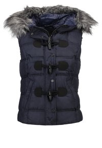 Marinblå pufferväst med huva fodrad med konstpäls, svart snod och knäppning, quiltad textur och sidofickor.