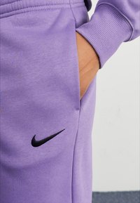 Nike Sportswear PANT - Treniņtērpa apakšdaļas - daybreak/black