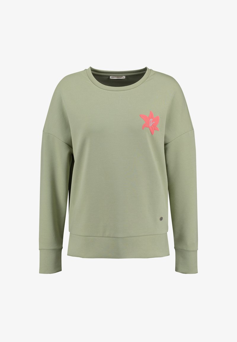 Sudadera verde claro con mangas largas, cuello redondo y una aplicación de flor rosa en el lado izquierdo delantero. Textura suave.